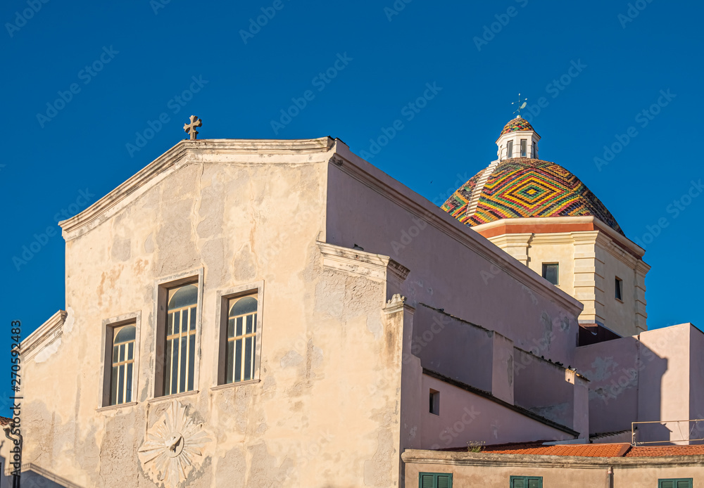 Majolica tiled cupola of Jesuit church of San Michele, Alghero (L'Alguer), Sardinia, Italy.  Famous for the beauty of its coast and beaches and its historical city center.