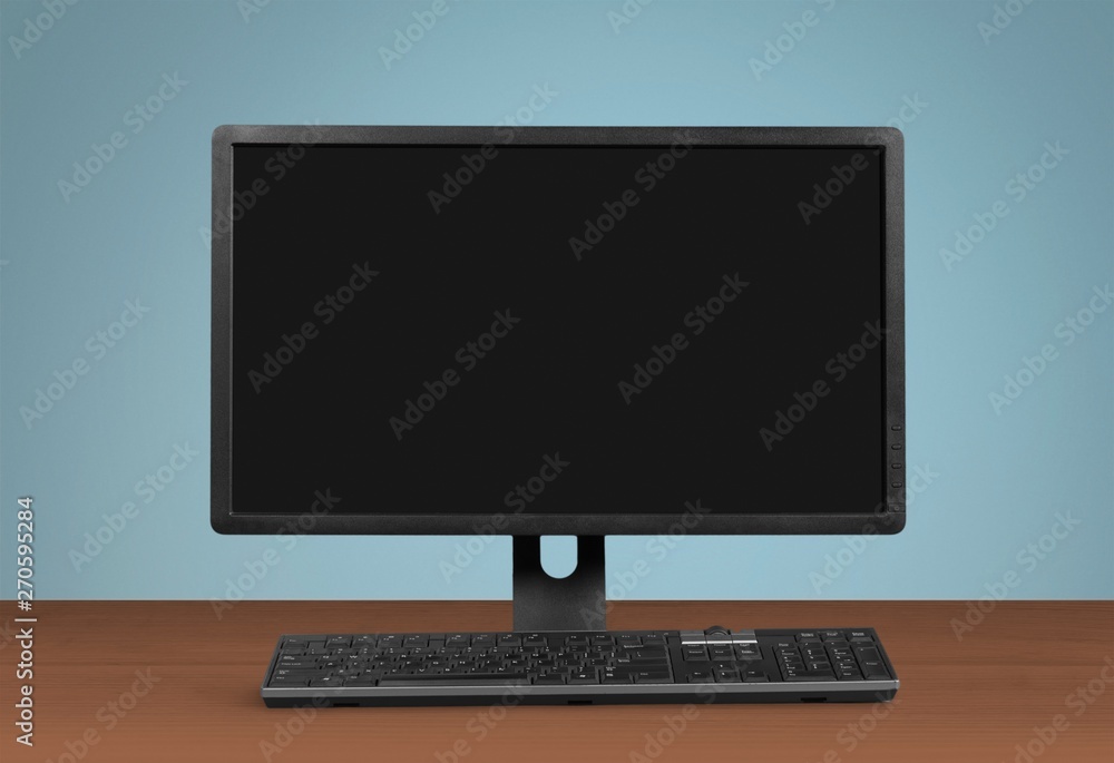 Blank computer monitor at the desk Blank computer monitor at the desk