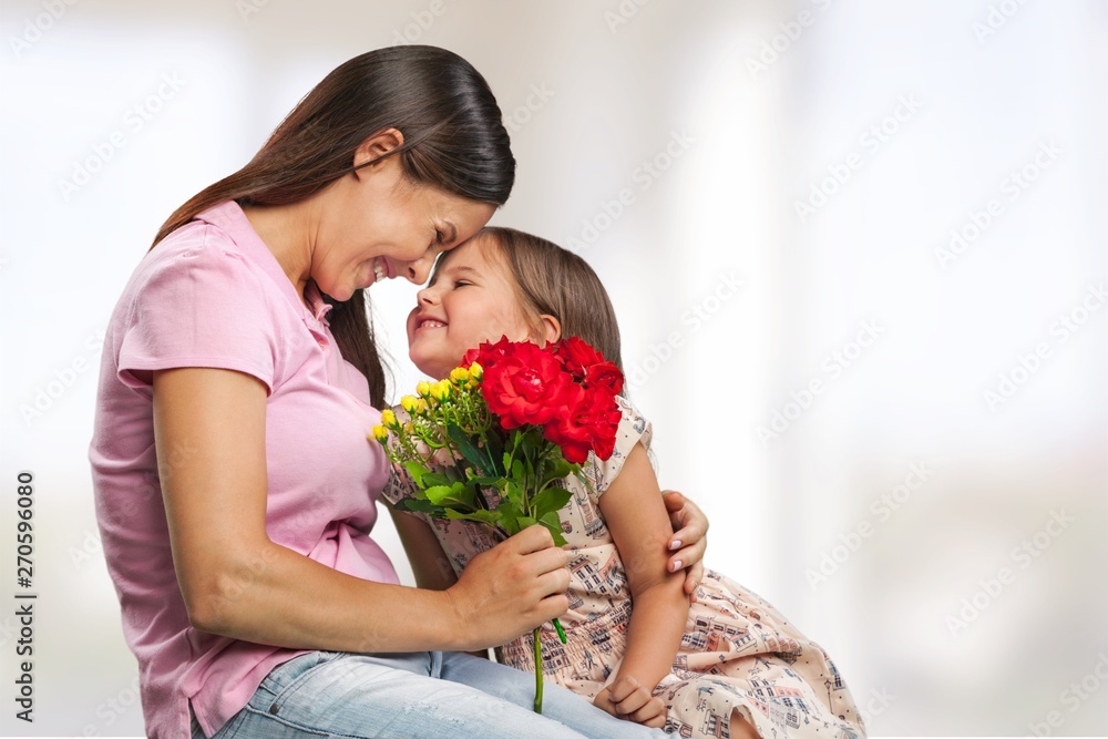 Happy Mother and daughter hugging Happy Mother and daughter hugging