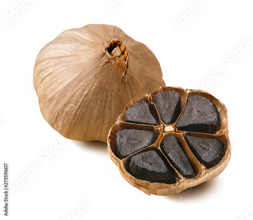 Obraz na plátně Black garlic bulbs isolated on white background