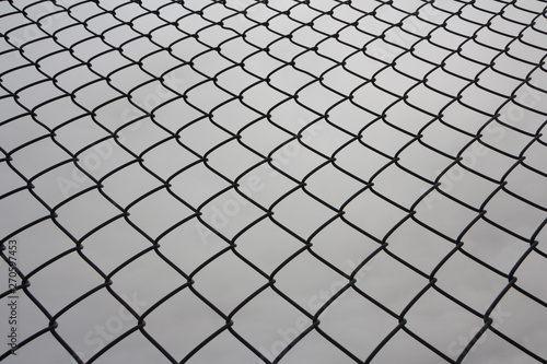 Gray mesh iron grid similar to the fish scale pattern