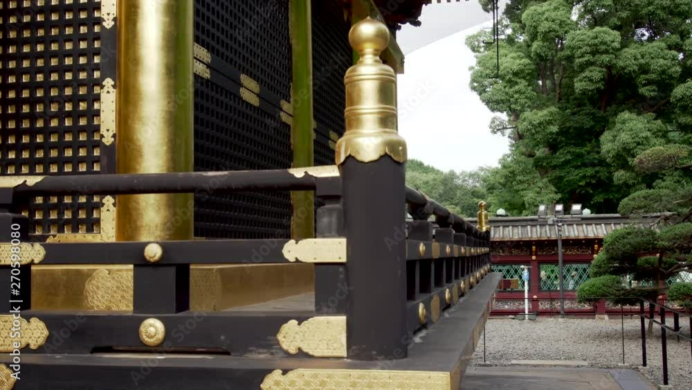 A golden detail of a Japanese temple A golden detail of a Japanese temple