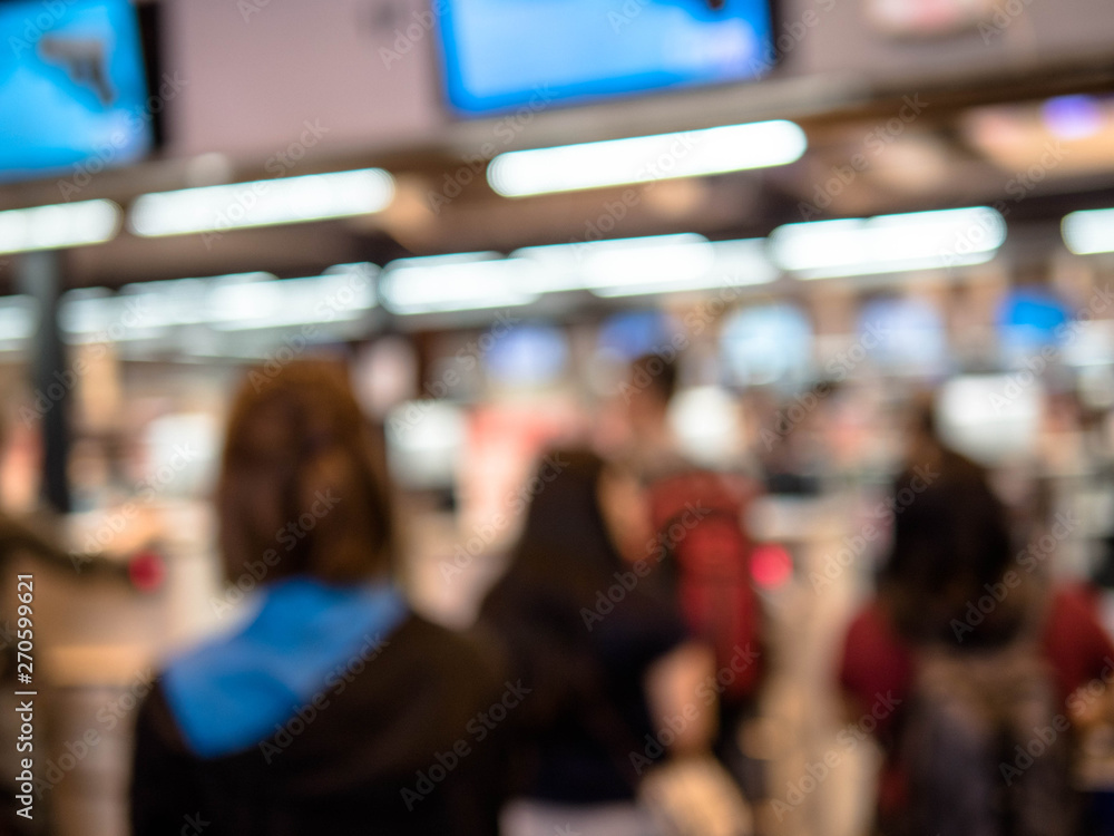 Blurred image of Check-in counter at the terminal(T1) of Airport.