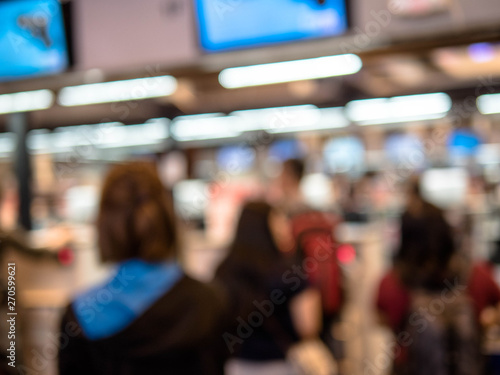 Blurred image of Check-in counter at the terminal(T1) of Airport.