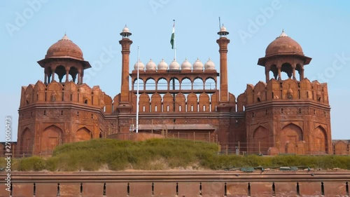 Red Fort the famous national landmark built of red sandstone in Old Delhi, India. Other name is lal Kila. Shot in motion photo