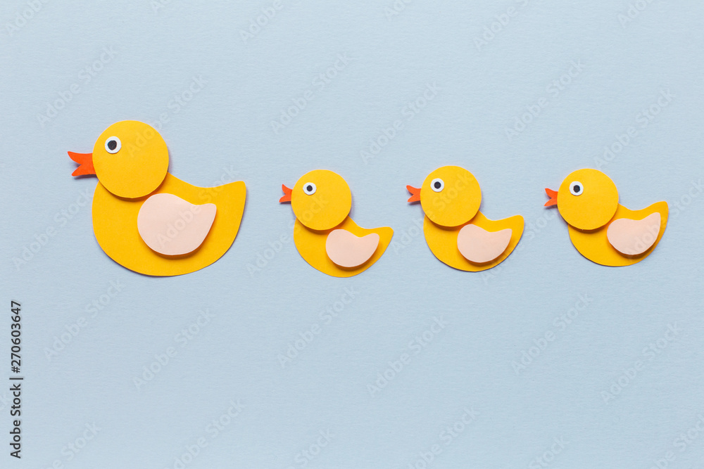 Mom Duck and duckling background of paper
