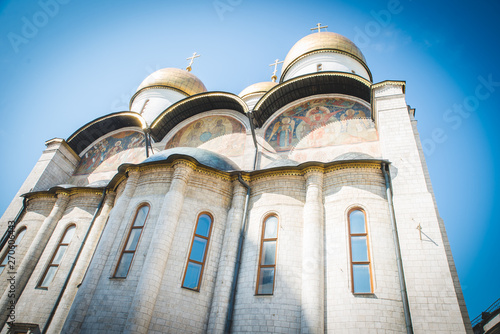 MOSCOW, RUSSIA – OCTOBER 16, 2018: Assumption Cathedral (Cathedral of the Dormition, Uspensky sobor) against the sky. Inside of Moscow Kremlin, Russia (day)