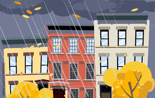 Flat cartoon illustration of autumn rainy city street. Dark clouds over the roofs of houses, it is raining. Street of town with bright colorful houses. Autumn twilight in the city background