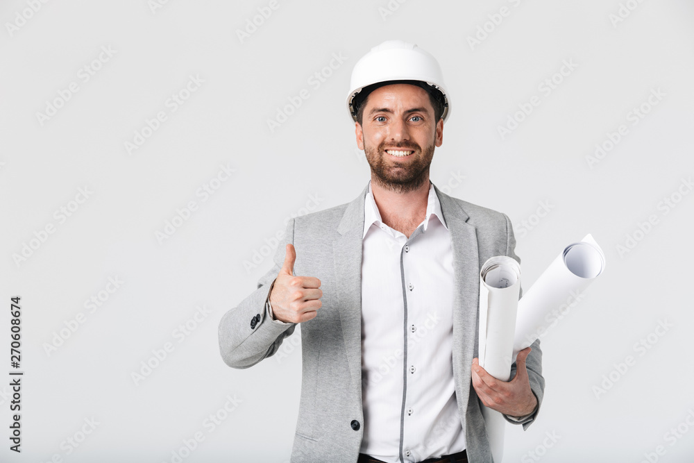 Confident bearded man builder wearing suit