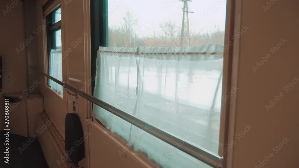 interior wagon railway carriage inside a railroad car. concept train journey lifestyle travel. view beautiful from the window of a moving train railway Russia winter. interior inside train interior wagon railway carriage inside a railroad car. concept train journey lifestyle travel. view beautiful from the window of a moving train railway Russia winter. interior inside train