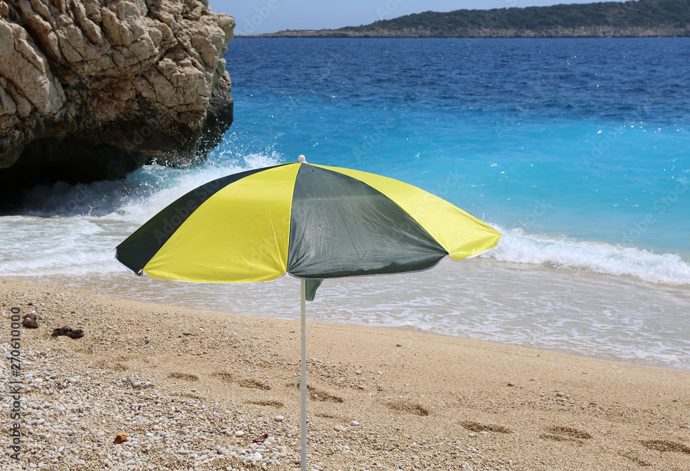 Single Colorful Umbrella at Kaputas Beach in Kas,Turkey