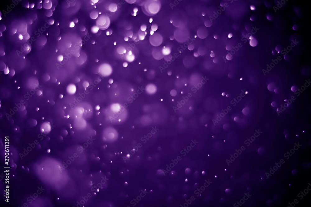 Obraz premium Bokeh purple proton background abstract