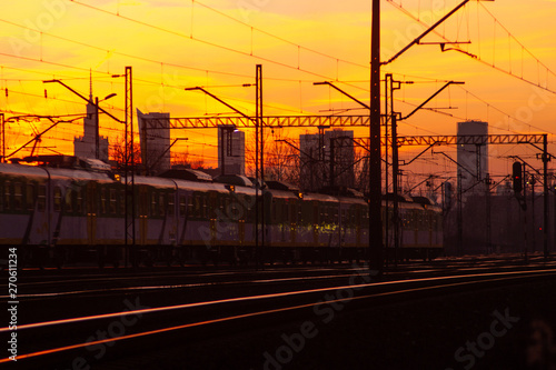 Photo of railway infrastructure at sunset.