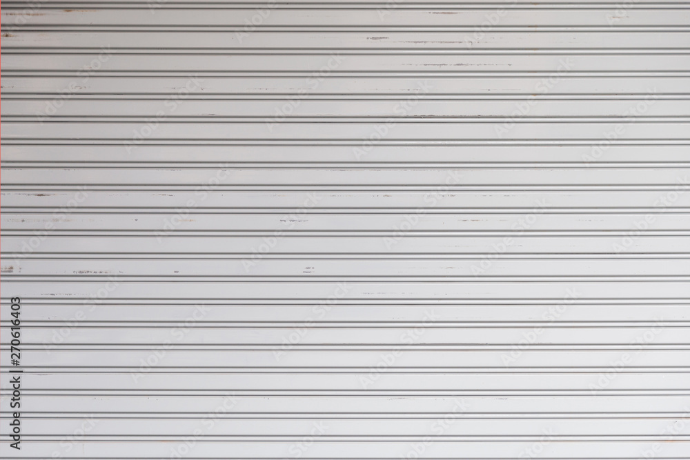 Fototapeta premium An old rolling steel door texture for background.