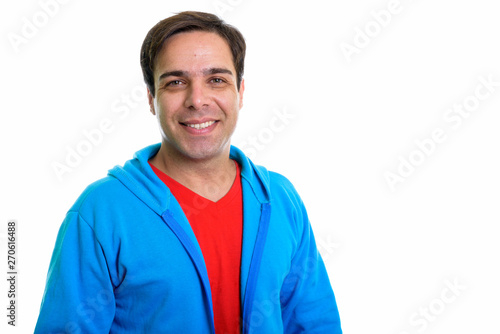 Close up of young happy Persian man smiling isolated against whi © Ranta Images