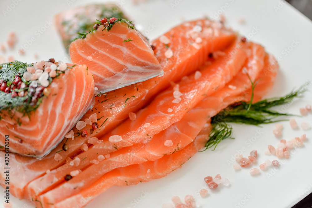 sliced salmon on white square plate sliced salmon on white square plate