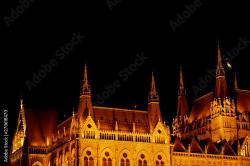 Budapest Hungary, 05.29.2019 Hungarian Parliament Building. night Budapest, glowing in gold. facade and roof of an old building