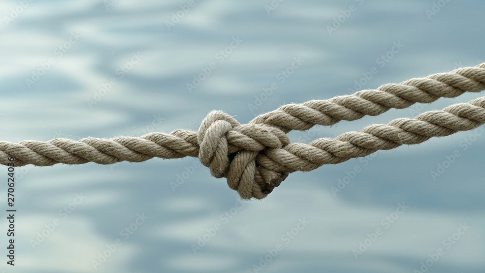 Rope Knot in front of the sea Rope Knot in front of the sea