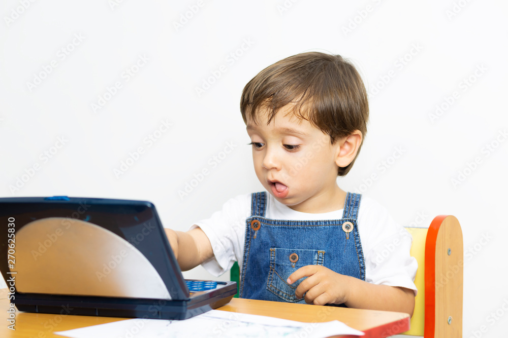 Happy Boy using laptop Happy Boy using laptop