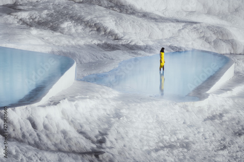 Scenic view of woman standing in water at Pamukkale, Turkey photo