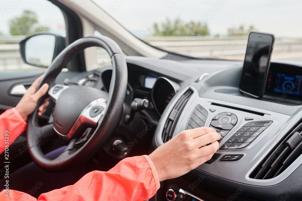 Sportswoman Operating Control On Car Dashboard Sportswoman Operating Control On Car Dashboard