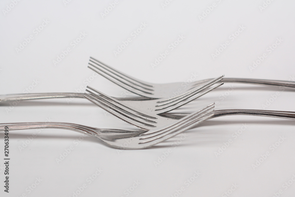 Cutlery , spoon and fork on white background Cutlery , spoon and fork on white background