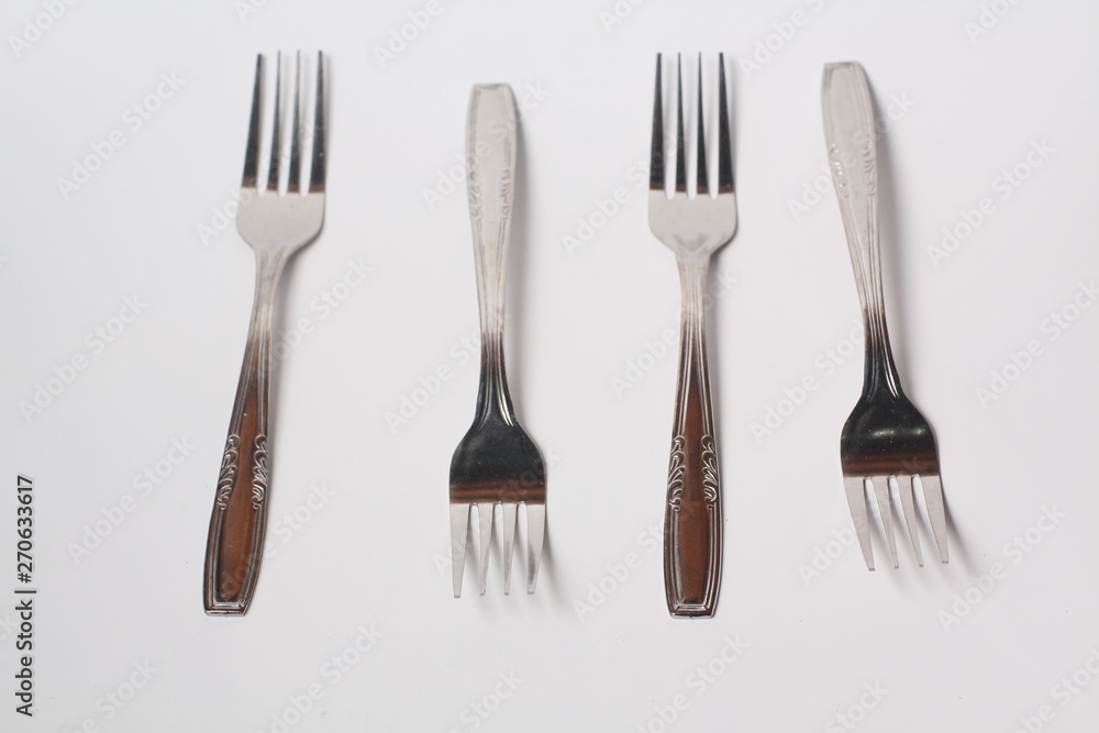 Cutlery , spoon and fork on white background Cutlery , spoon and fork on white background