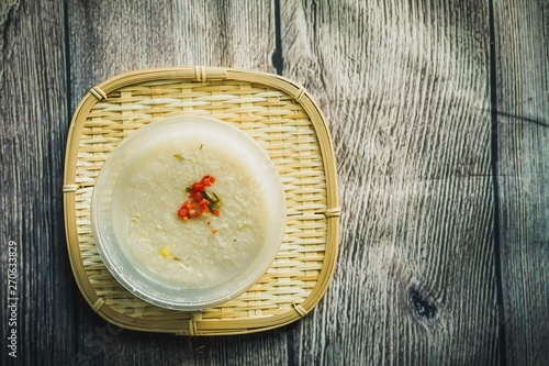 Bubur Lambuk, a popular Malaysian porridge which has been cooked with big pot and main ingredients are rice,meat,water and her usually during ramadhan, the fasting month  photo