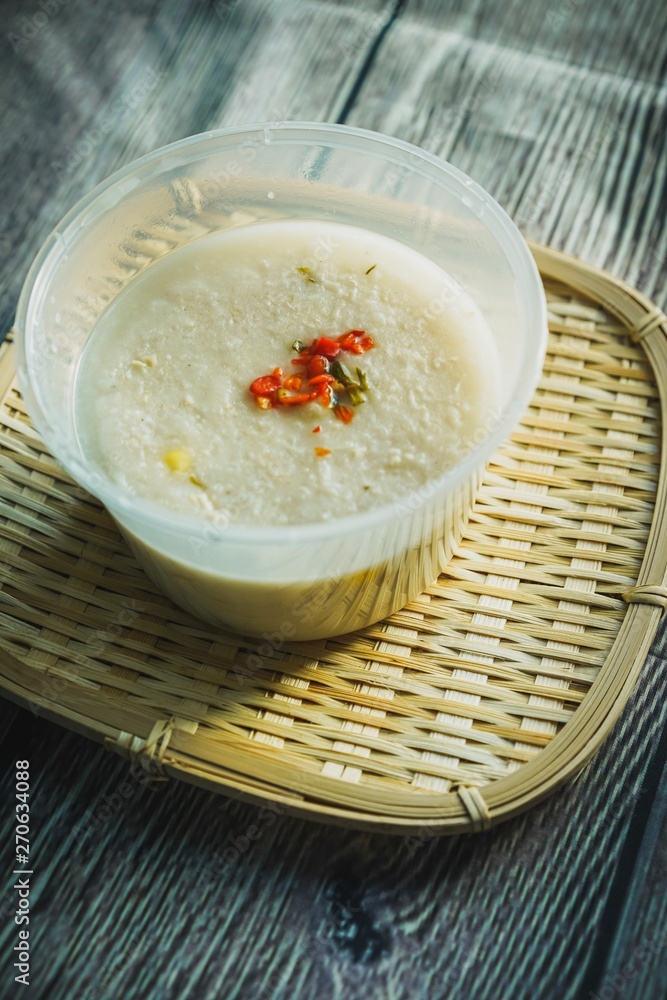 Bubur Lambuk, a popular Malaysian porridge which has been cooked with big pot and main ingredients are rice,meat,water and her usually during ramadhan, the fasting month Bubur Lambuk, a popular Malaysian porridge which has been cooked with big pot and main ingredients are rice,meat,water and her usually during ramadhan, the fasting month