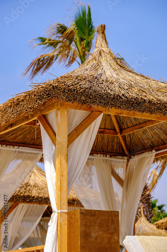 Quadro su tela View of the bungalow on the beach of the Mediterranean