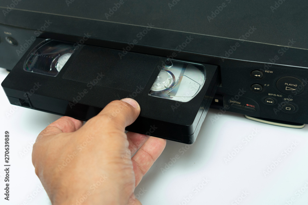 High angle shot on video tape inserted in VCR. CCTV tape recorder