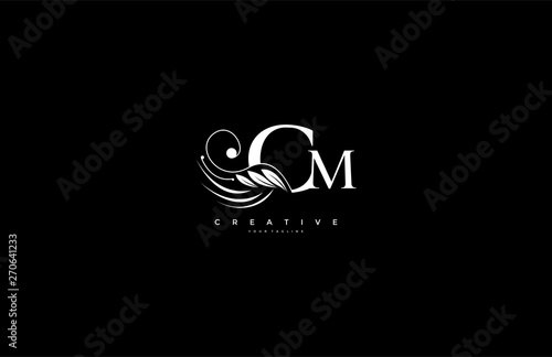 Initial CM letter luxury beauty flourishes ornament monogram logo