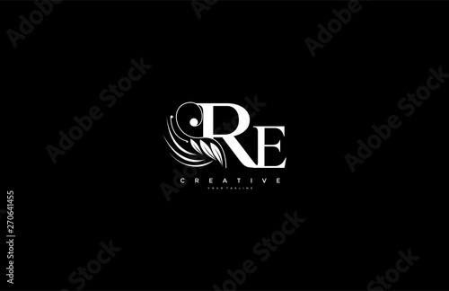 Initial RE letter luxury beauty flourishes ornament monogram logo