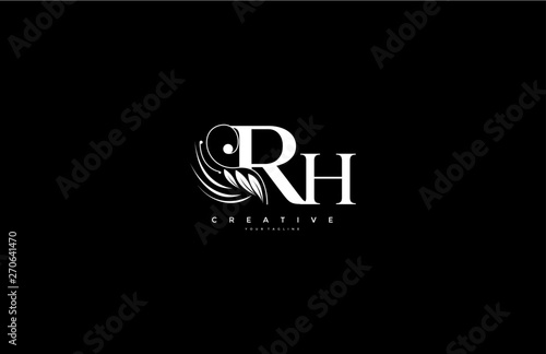 Initial RH letter luxury beauty flourishes ornament monogram logo