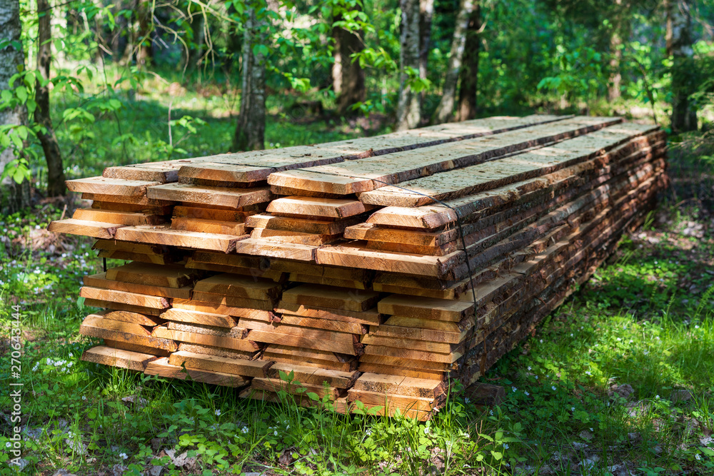 outdoor rack of wood planks