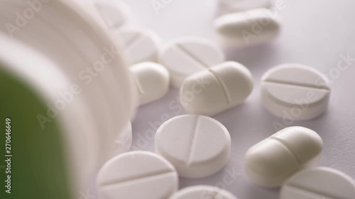 Close up of Healthy pills rotate on table