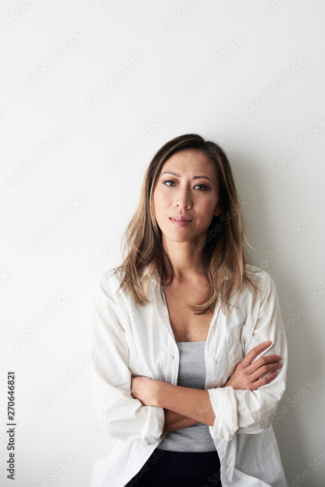 Stylish woman serious portrait at home. Stylish woman serious portrait at home.