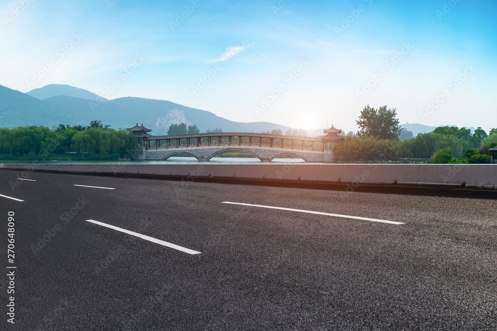 Fototapeta premium Road Pavement and Natural Landscape of Landscape..