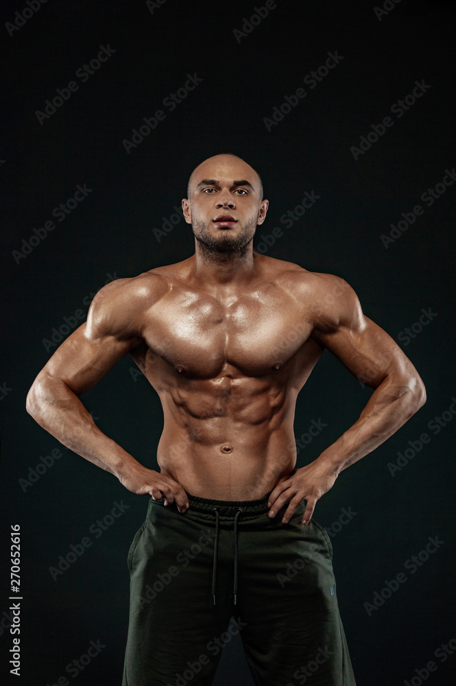 Bodybuilding competitions on the scene. Man sportsmen bodybuilder physique and athlete. Fitness motivation.