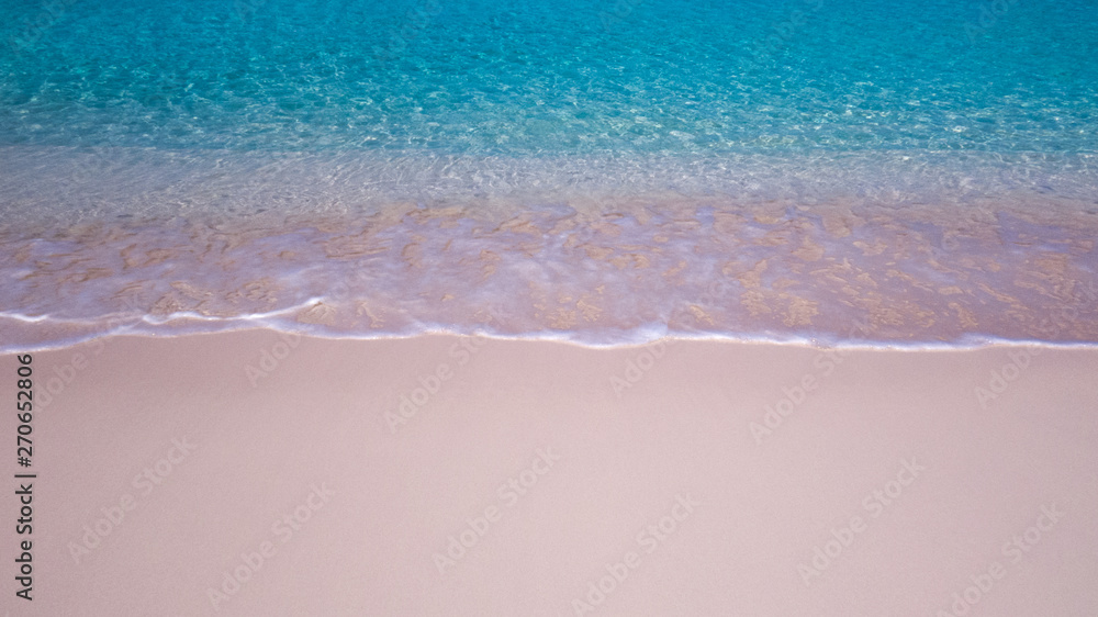 A peaceful view of the beach with small waves and a perfect layer of fine sand. Nassau, The Bahamas. A peaceful view of the beach with small waves and a perfect layer of fine sand. Nassau, The Bahamas.