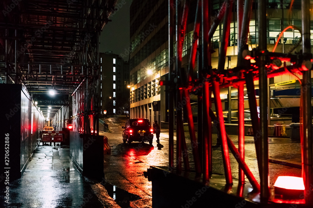 Building site in London during a rainy night. UK. Building site in London during a rainy night. UK.