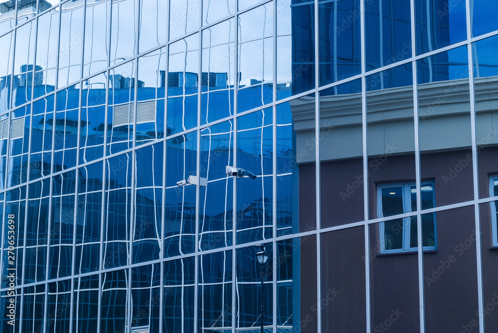Obraz premium high-tech citysсape, fragment of glass and metal building facades