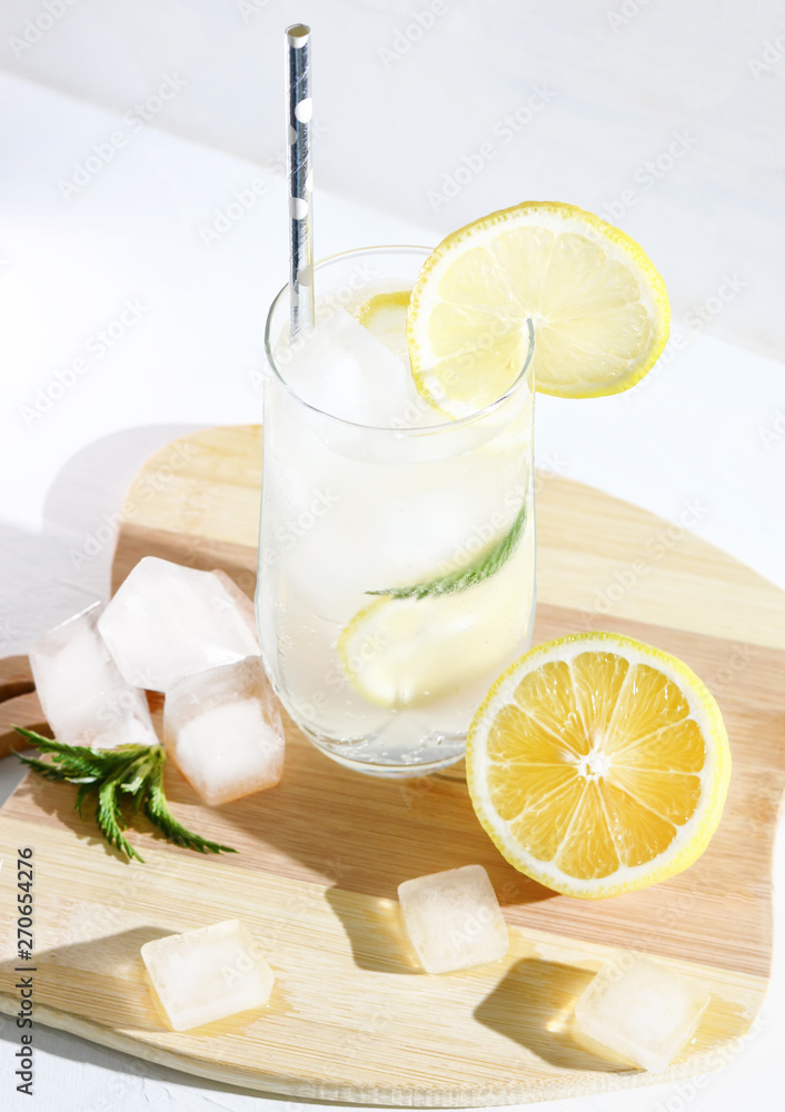 Cold drink, cocktail with ice and lemon. Selective focus. Cold drink, cocktail with ice and lemon. Selective focus.