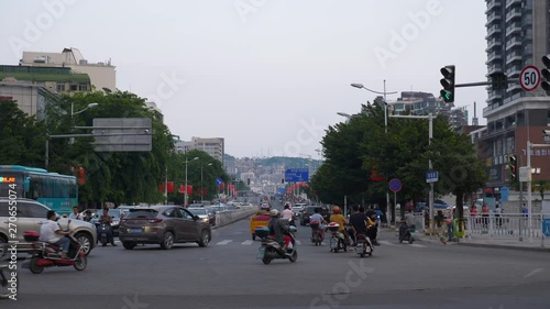 sanya city evening time traffic street slow motion panorama 4k hainan china