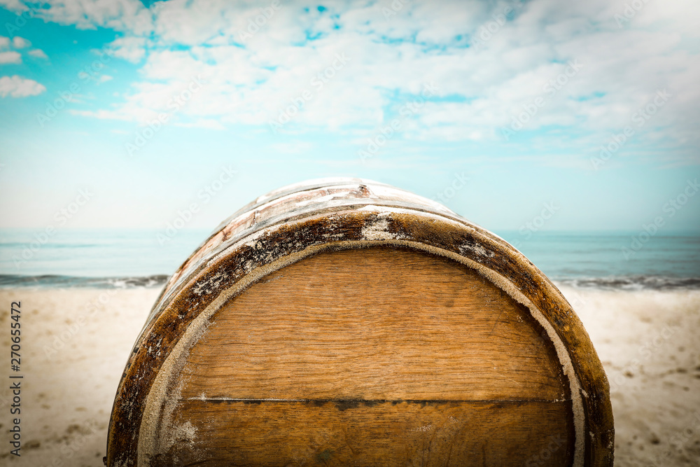 barrel on sand and beach background. 