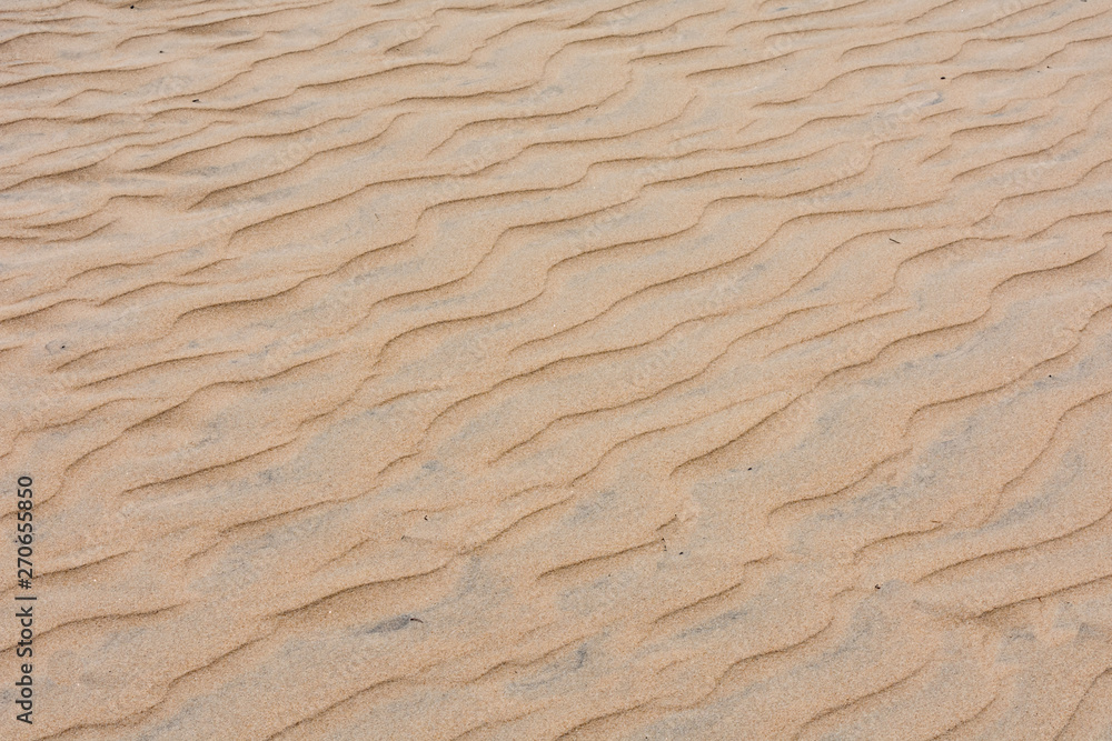 Sea beach clean sand pattern made by sea waves after gone in sunny day. Sea beach clean sand pattern made by sea waves after gone in sunny day.
