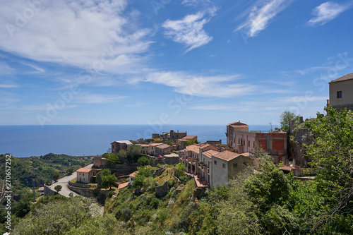 Landscape picture of town Savoca which is a municipality in the Province of Messina in the Italian region Sicily. Beautiful historic town from middle ages, houses made from stone with terracotta roofs