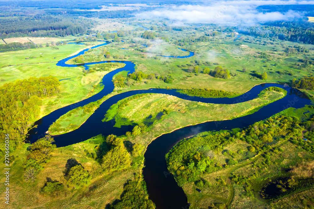 Aerial view on summer river. River stream on green meadow. Summer nature  landscape. Drone view on riverside. Photos | Adobe Stock