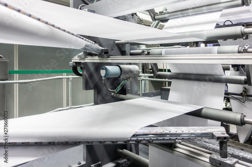 Folding Machines in Printing Production Factory Industrial Equipment Detail Closeup