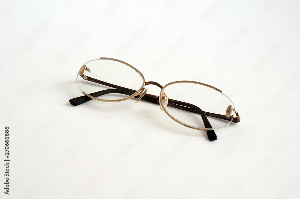 Black eye glasses spectacles with shiny black frame For reading daily life To a person with visual impairment. White background as background health concept with copy space. Black eye glasses spectacles with shiny black frame For reading daily life To a person with visual impairment. White background as background health concept with copy space.